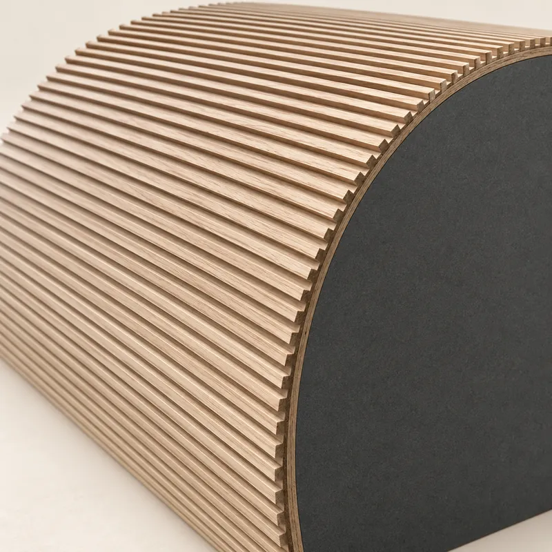 Curved oak fluted panel bent around a radius on an MDF former