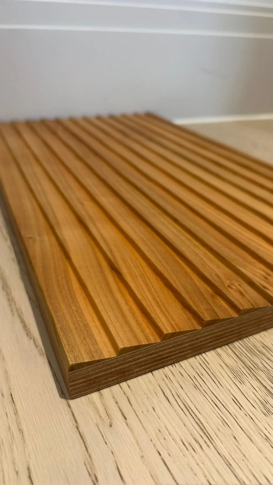 Oiled oak reeded timber panel suitable for bespoke kitchen island joinery