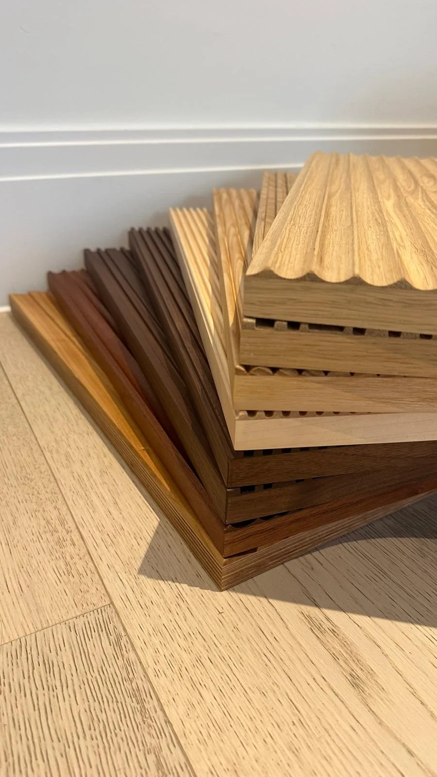 Trade sample stack of real timber fluted and reeded panel profiles