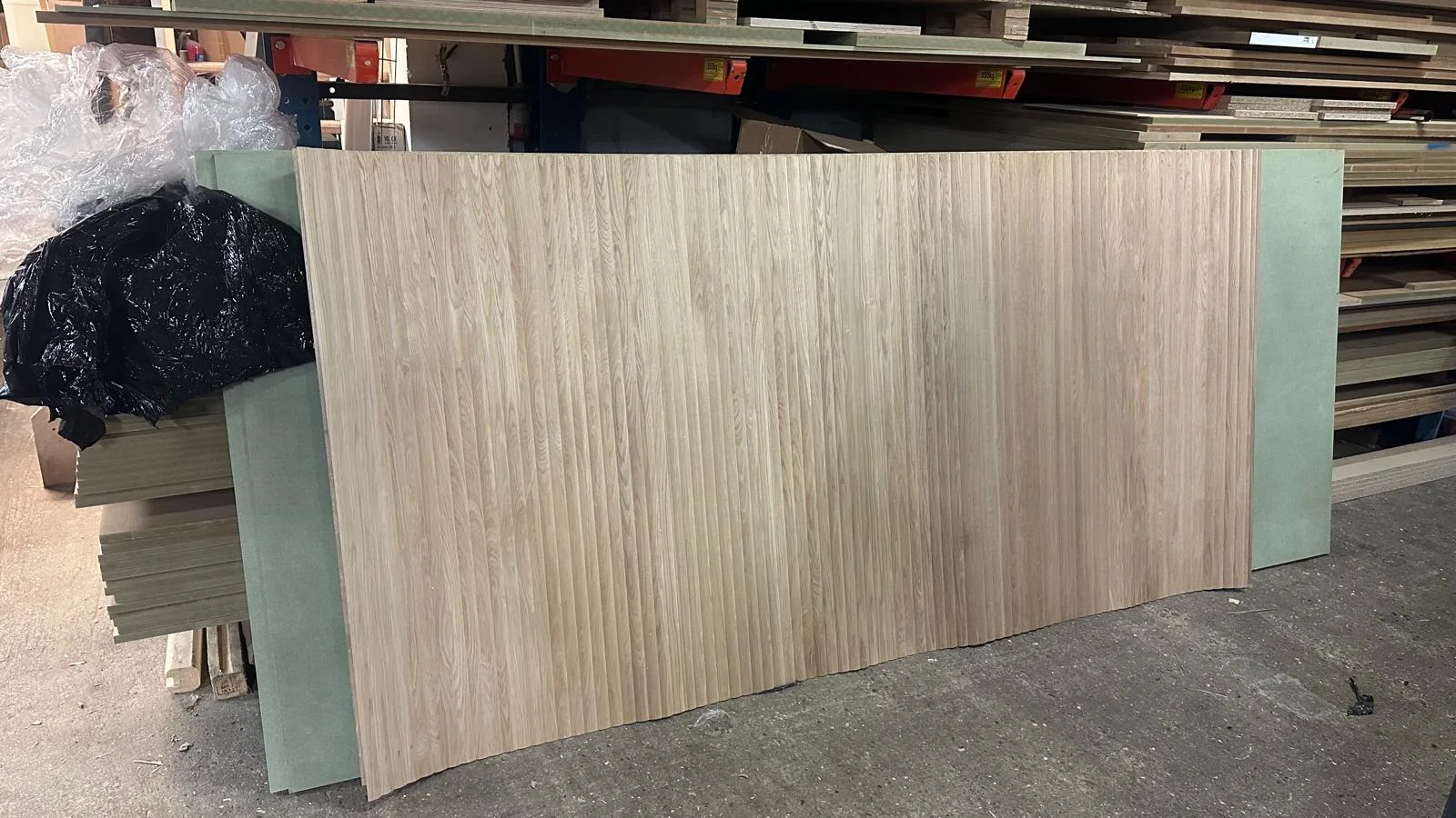 Real timber veneered panel being prepared in a joinery workshop