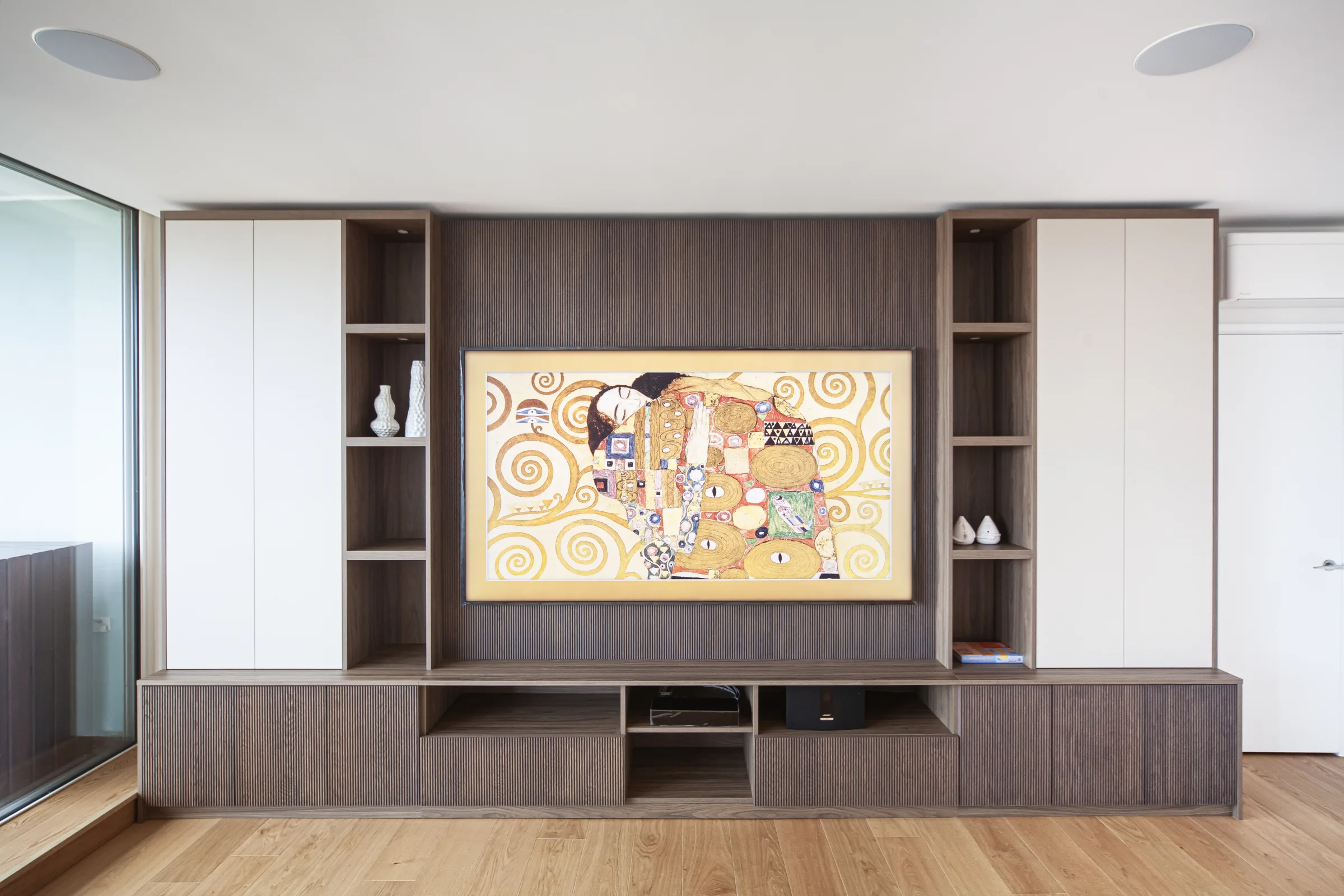Furniture-grade fluted real timber surface used in an architectural interior